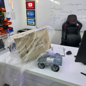 Arduino-based fire fighting robot equipped with flame sensors, water spray system, and motorized chassis designed for automatic fire detection and extinguishing.