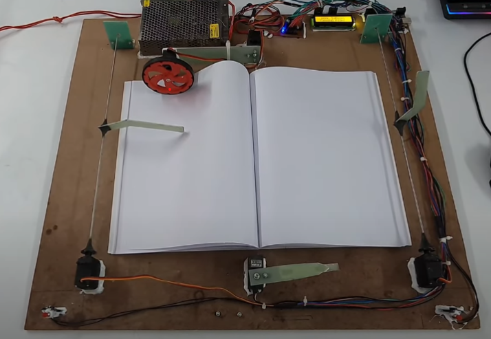 Automatic Page Turner project using Arduino and Servo motors (real pic ture od video)